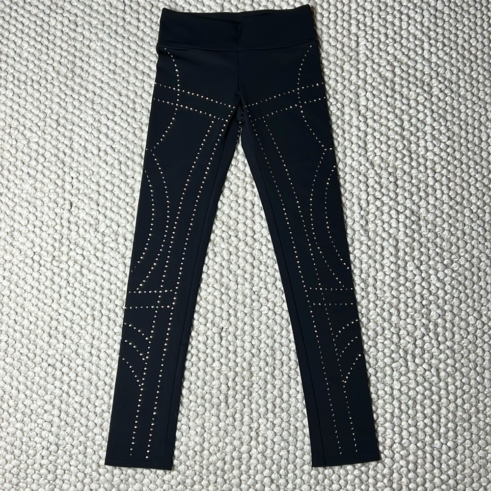 Swarovski crystal studded leggings by DeluXXXe